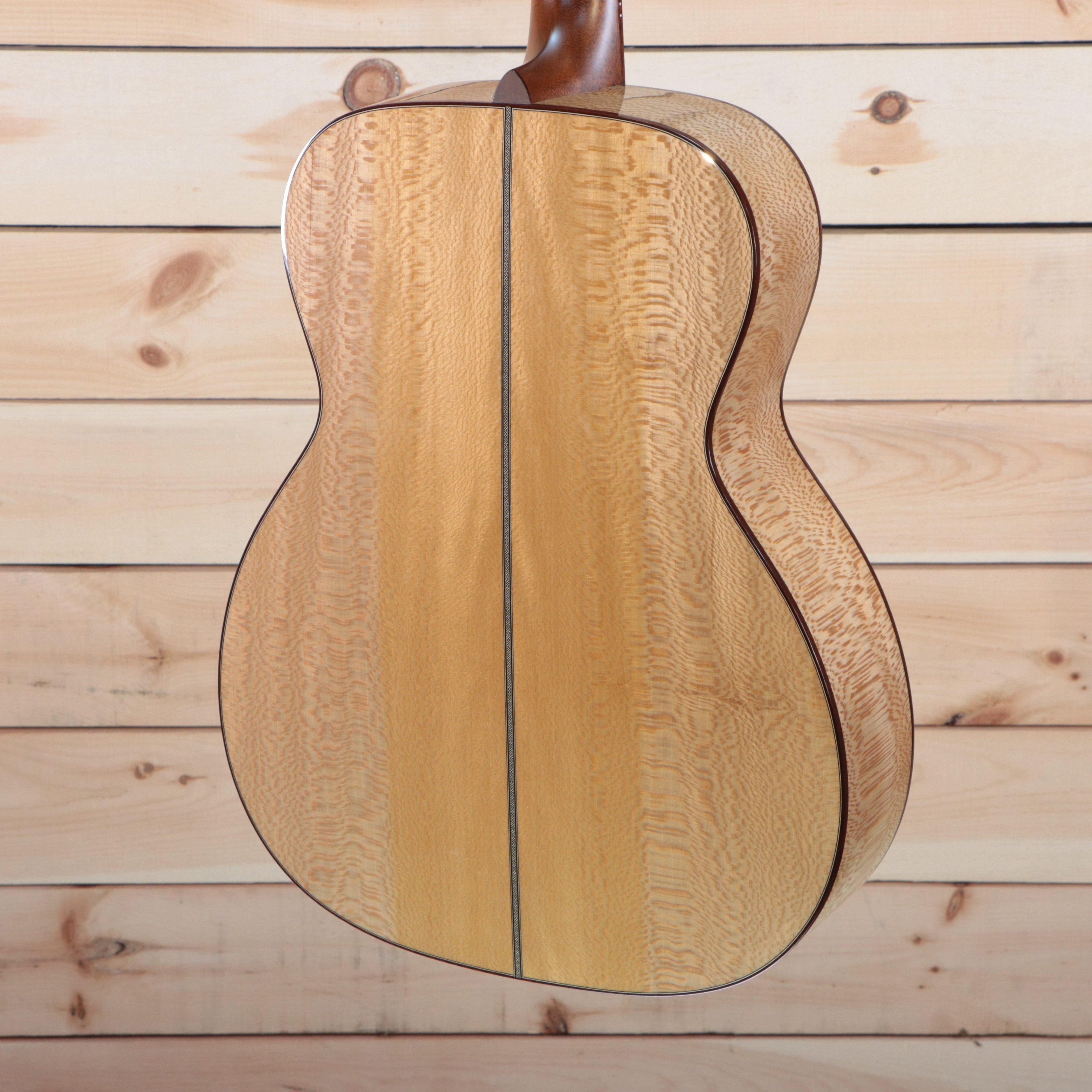 Santa Cruz OM Grand Custom acoustic guitar Natural with quilted maple back and dark binding