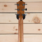 Taylor 818e Grand Orchestra acoustic-electric guitar natural finish with chrome Taylor tuners rear headstock view
