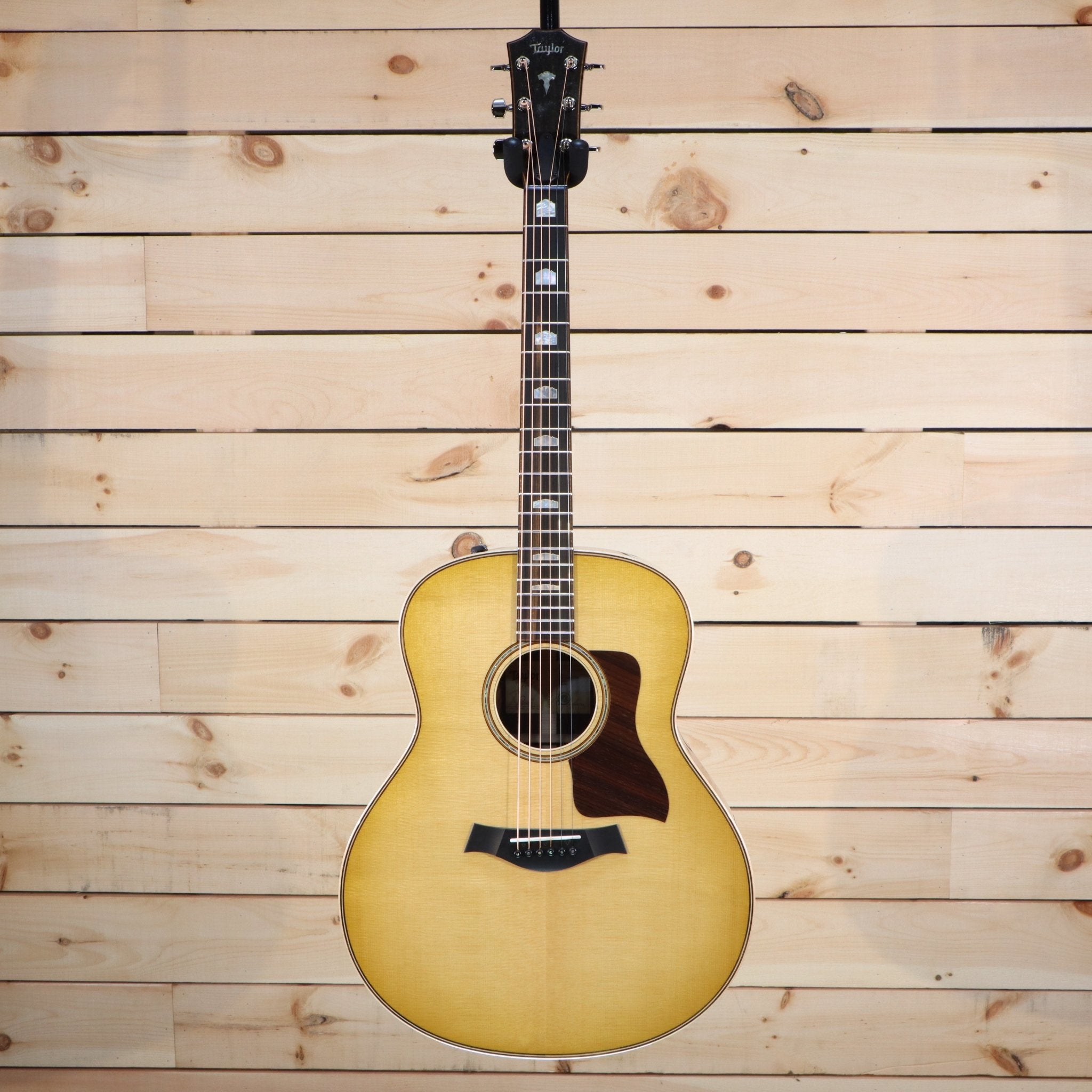 Taylor 818e Grand Orchestra acoustic-electric guitar natural finish with rosewood pickguard and body binding