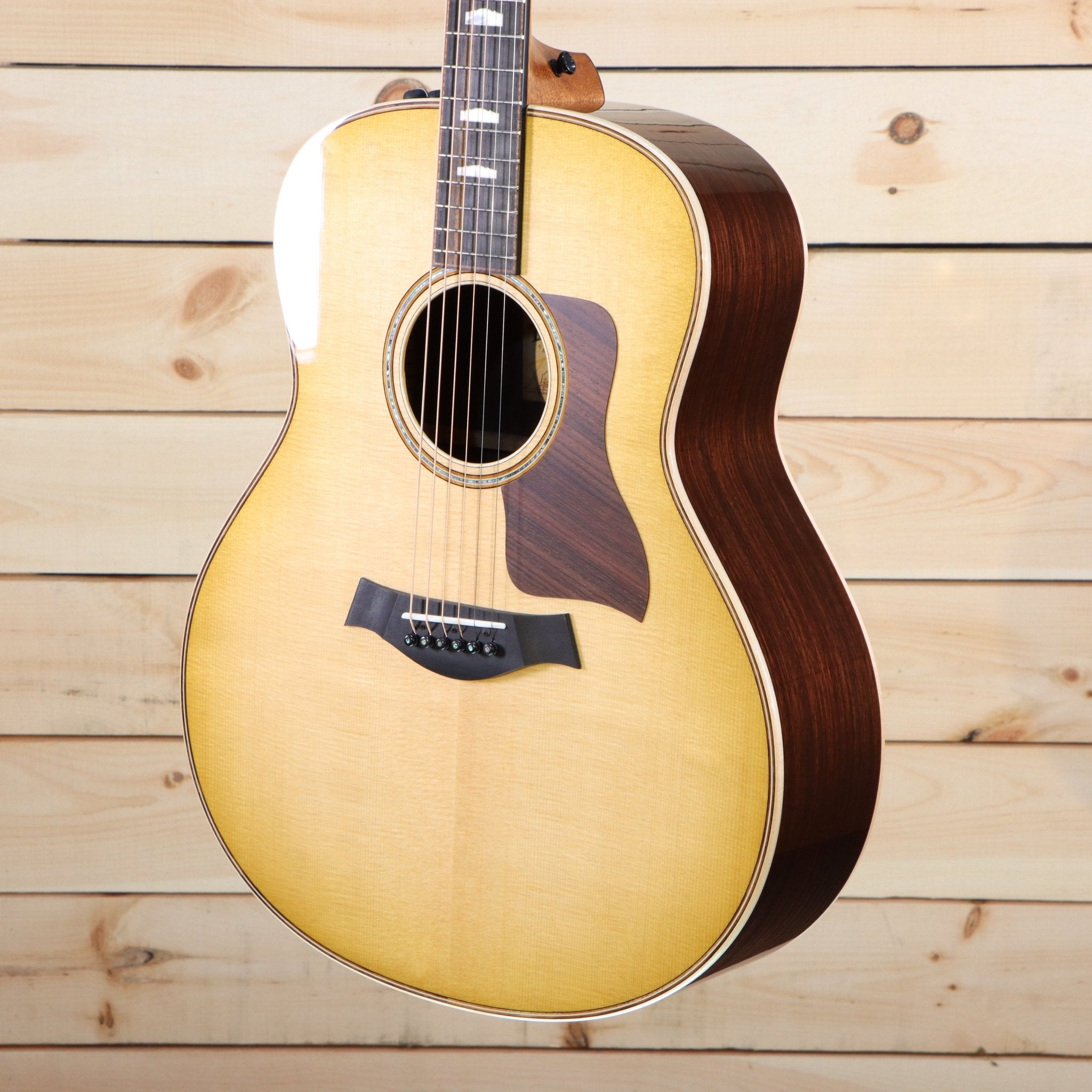 Taylor 818e Grand Orchestra acoustic-electric guitar natural spruce top with rosewood back and sides binding