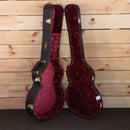 Taylor Custom GA acoustic guitar hardshell case open showing burgundy velvet interior with gold hardware