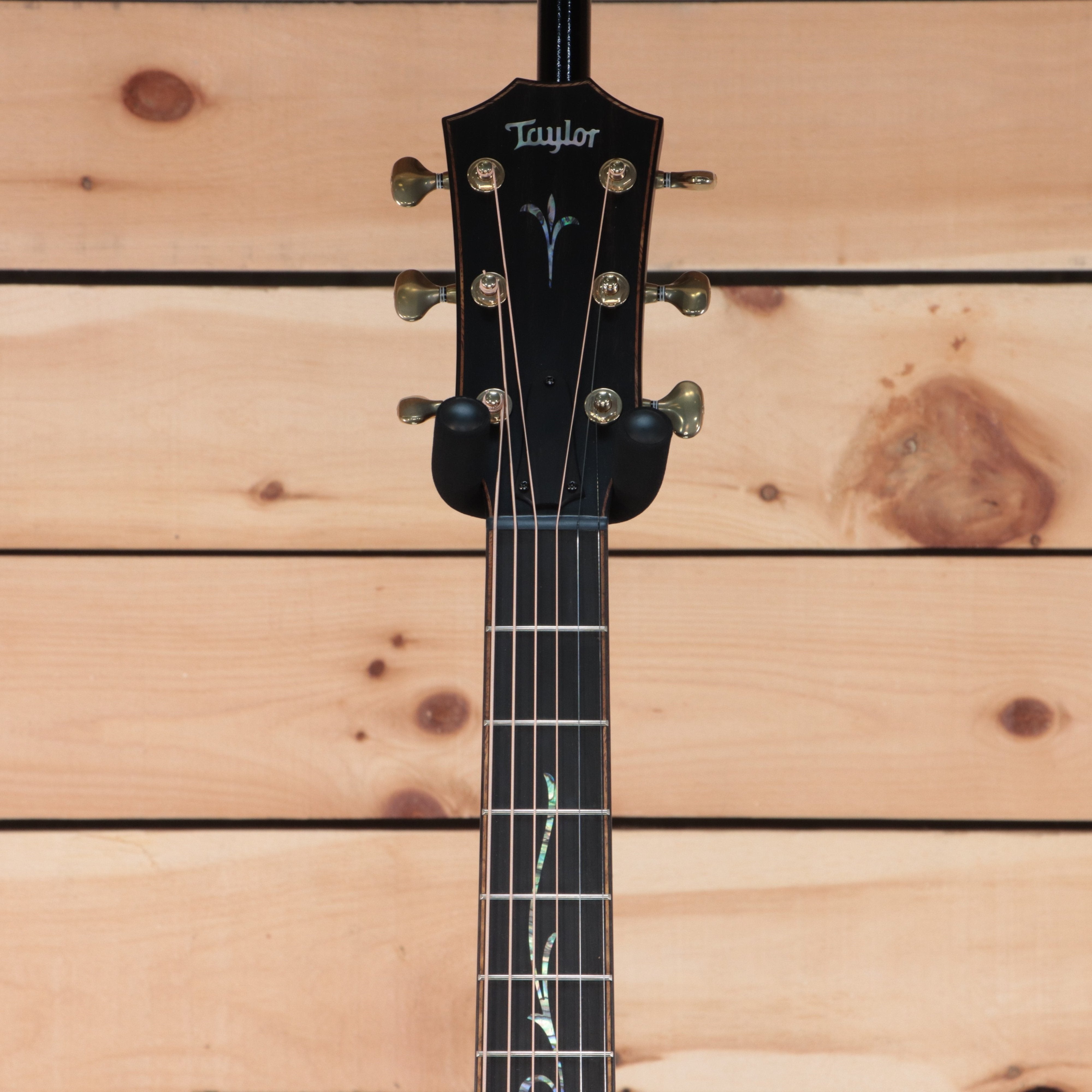 Taylor 2022 K14ce Builder's Edition acoustic-electric guitar black headstock with abalone floral fretboard inlay gold tuners