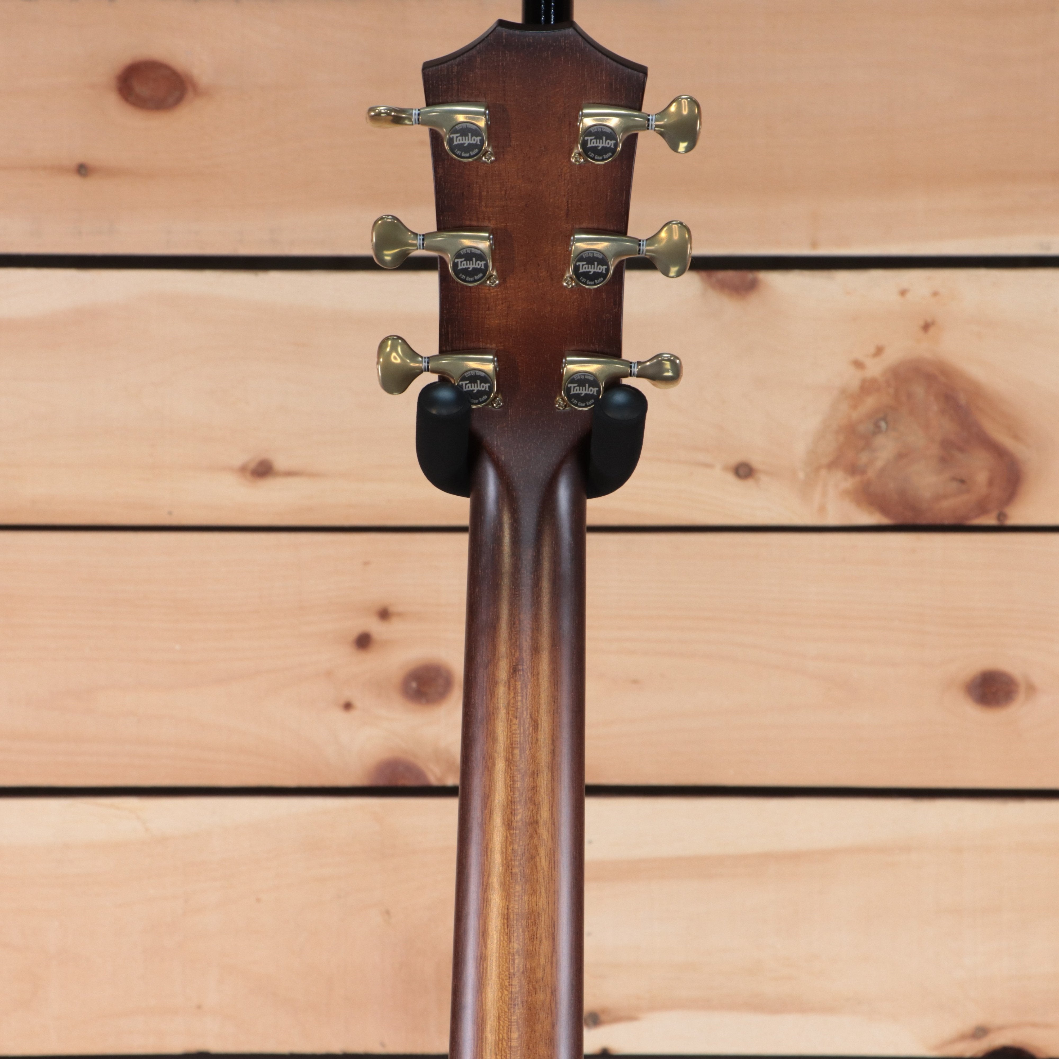 Taylor K14ce Builder's Edition acoustic-electric guitar back view with gold Taylor tuning machines