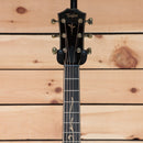 Taylor K26ce Grand Symphony acoustic-electric guitar black headstock with gold tuners and floral fretboard inlay
