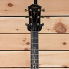 Taylor K26ce Grand Symphony acoustic-electric guitar black headstock with gold tuners and floral fretboard inlay