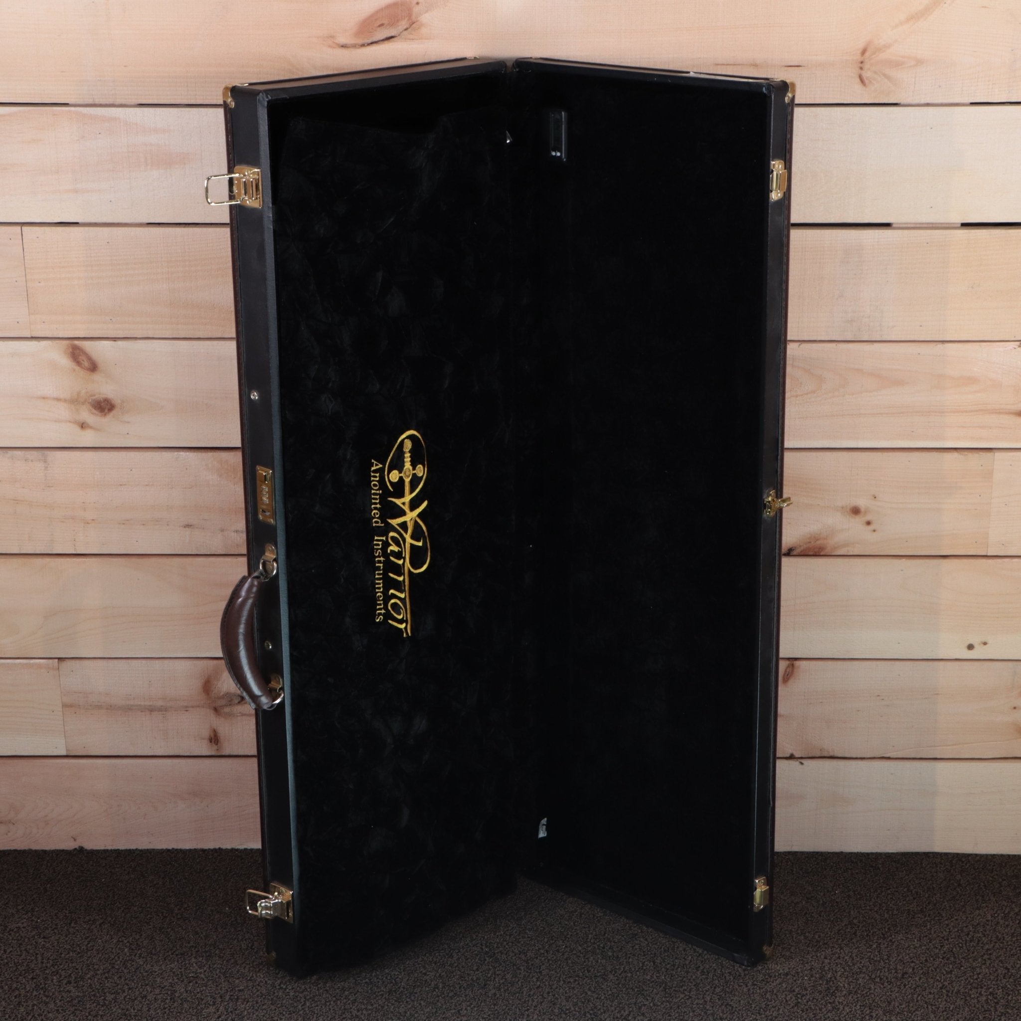 Warrior Anointed Instruments The Passion W-001 electric guitar hardshell case black velvet interior gold hardware