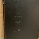 Warrior The Passion W-001 electric guitar back view showing black finish with visible wear and scratches