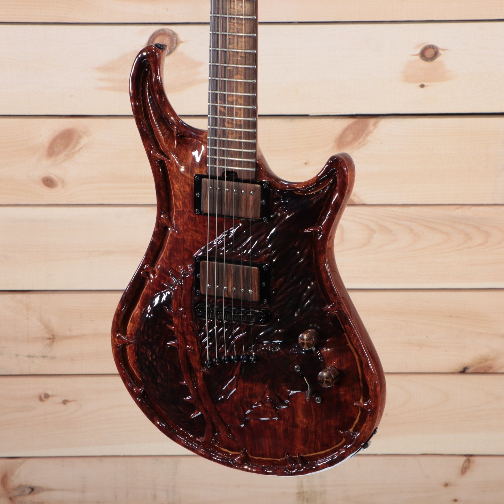 Warrior The Passion electric guitar deep red figured wood top with dual humbuckers and dark fretboard